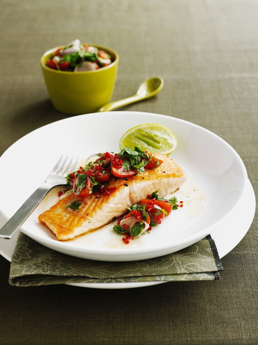 Plate of salmon with tomato salsa