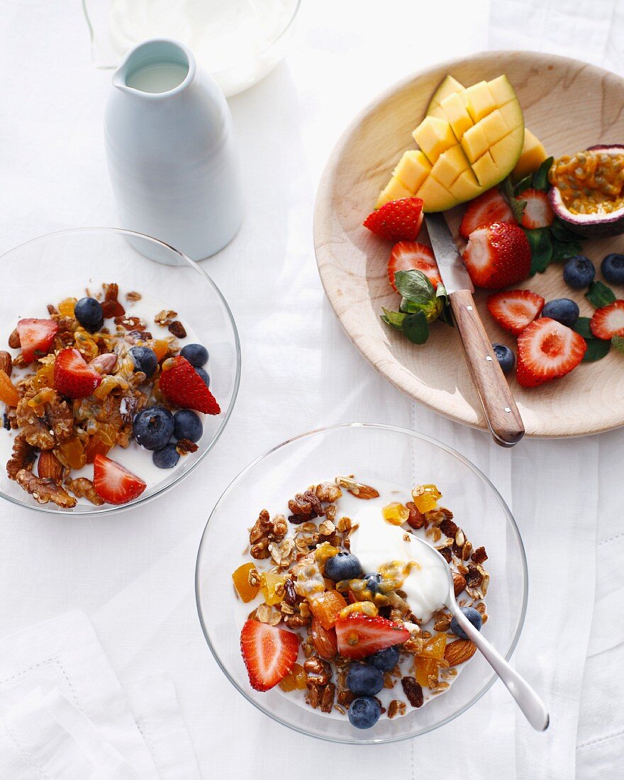 Bowls of apricot granola with fruit