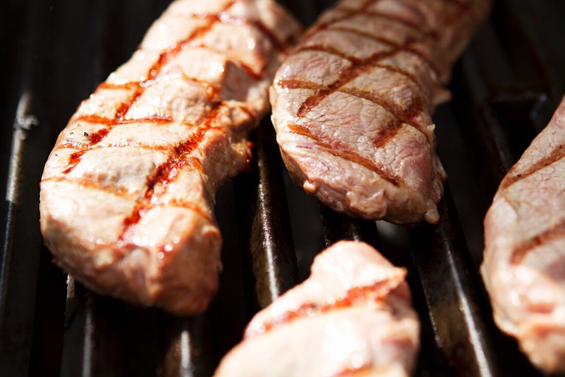 Veal steaks on a barbecue