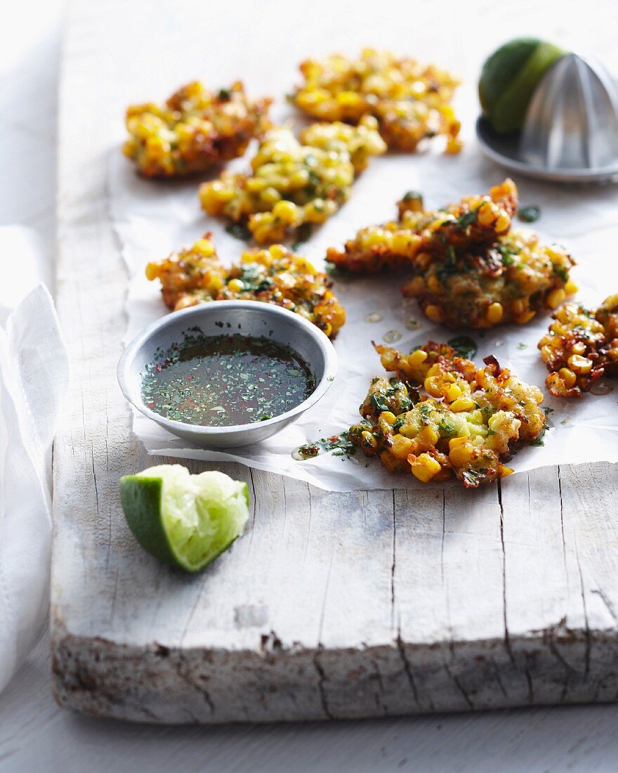 Thai corn fritters on wooden board