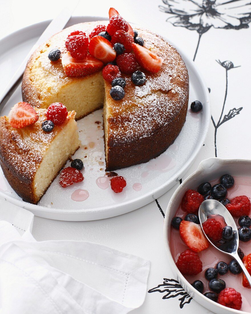 Plate of rose cake with berries