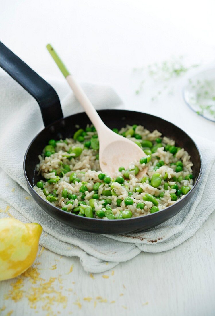 Pea and bean risotto with lemon