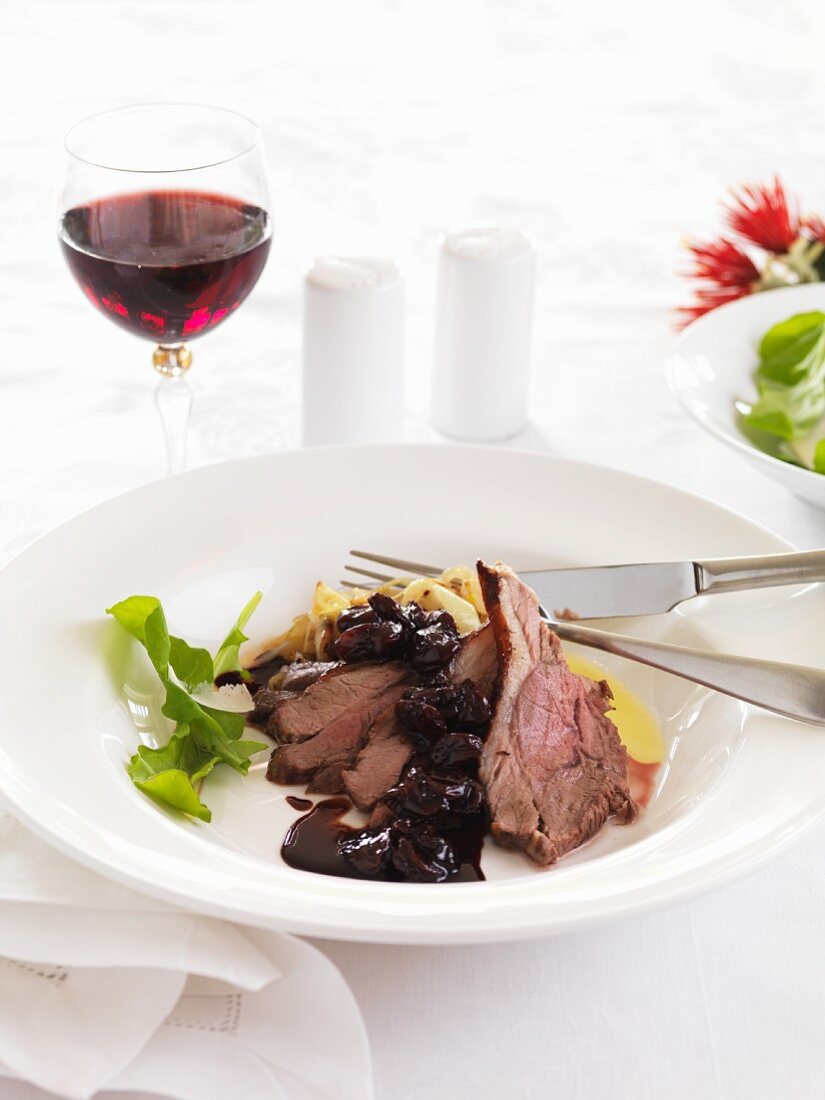 Lamb with a cherry and red wine gravy
