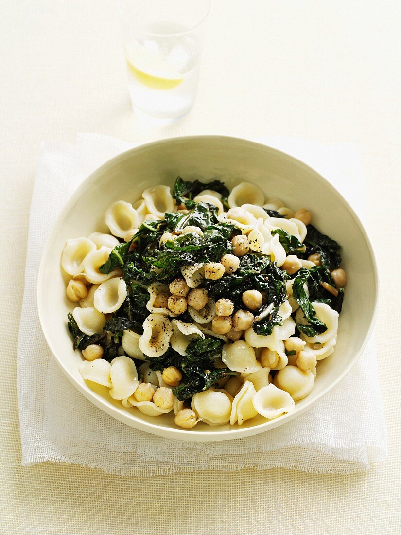 Bowl of pasta with spinach and beans