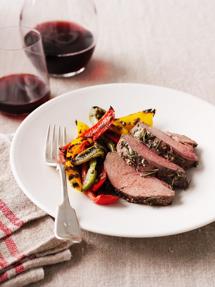 Plate of pork with roasted vegetables