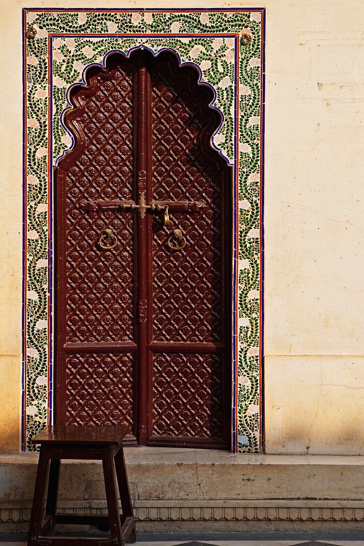 Brown Ornate Arched Door in the City Palace