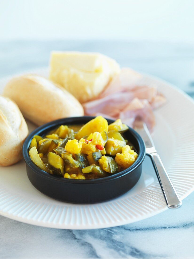Piccalilli with baguette rolls