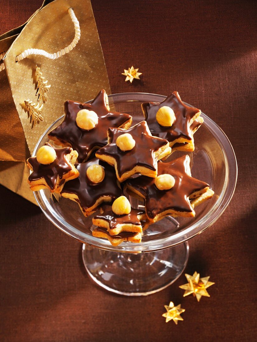 Nougat stars with chocolate glaze and hazelnuts