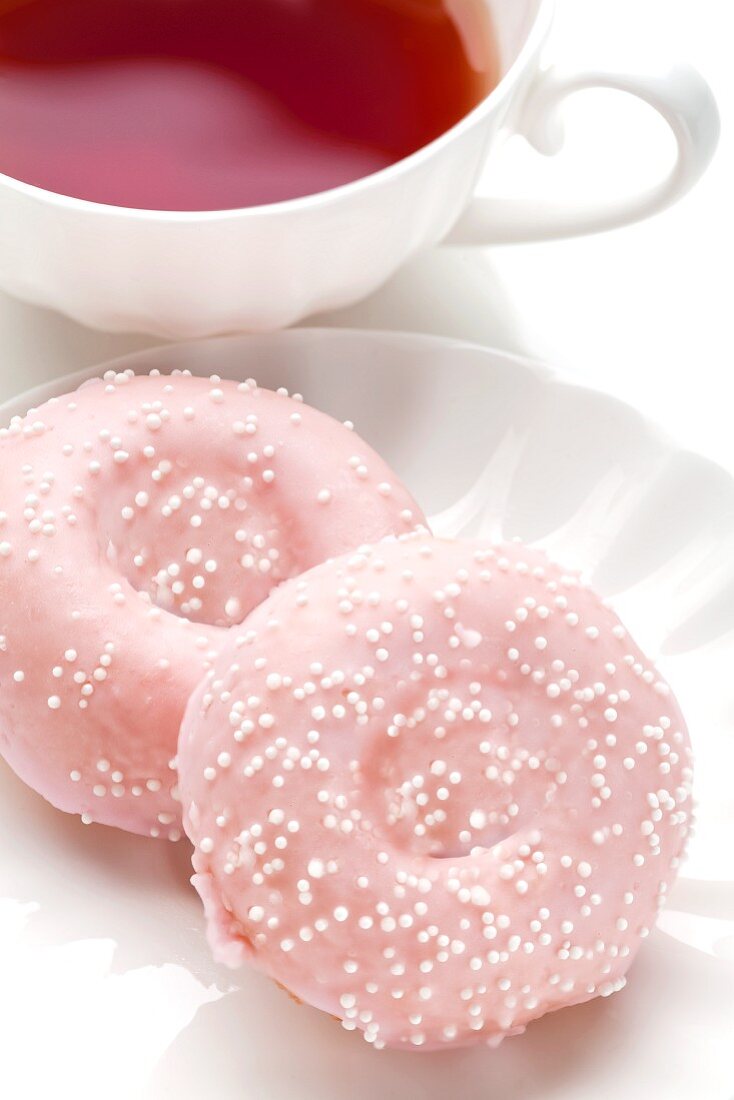 Pink Donuts with a Cup of Tea