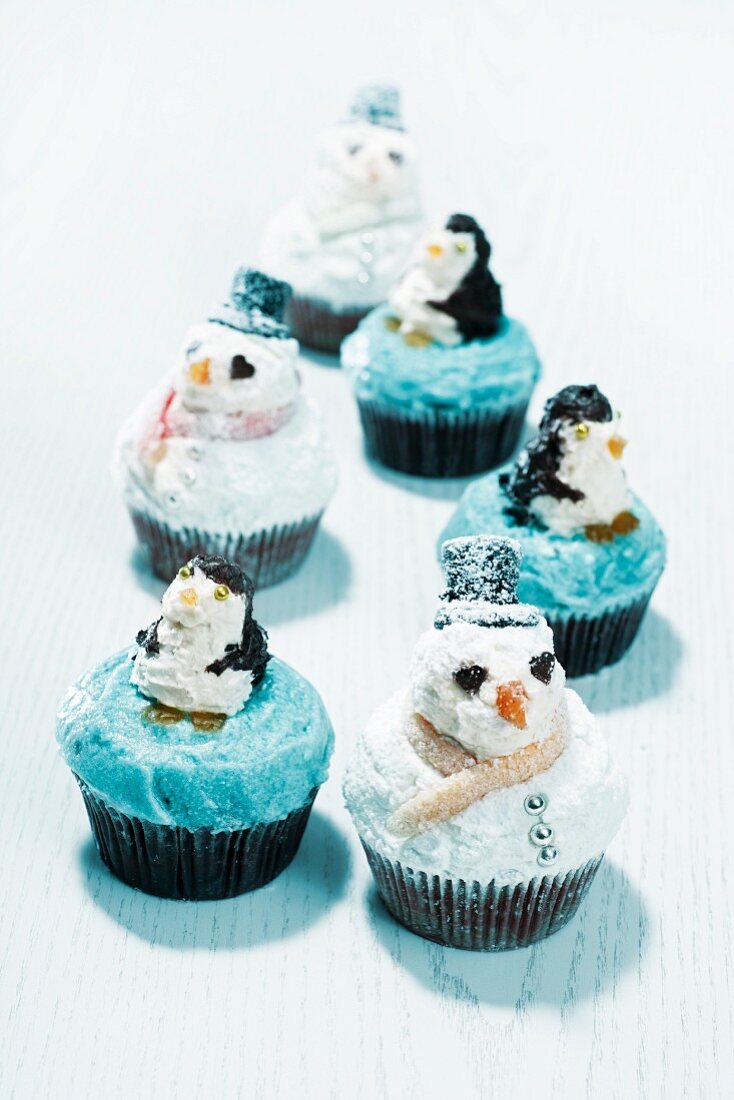 Cupcakes mit Pinguinen und als Schneemänner