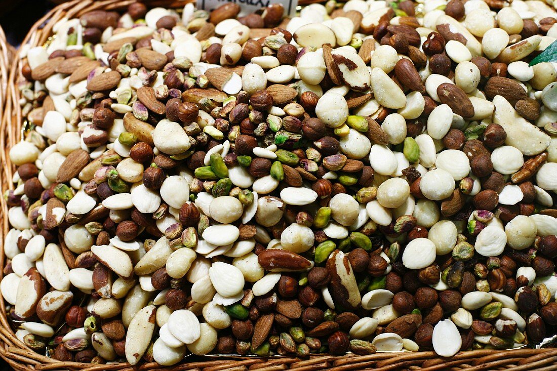 Mixed Nuts; Pistachios, Almonds, Hazelnuts, Brazil, Macadamia; on display at the La Boqueria Market in Barcelona, Spain