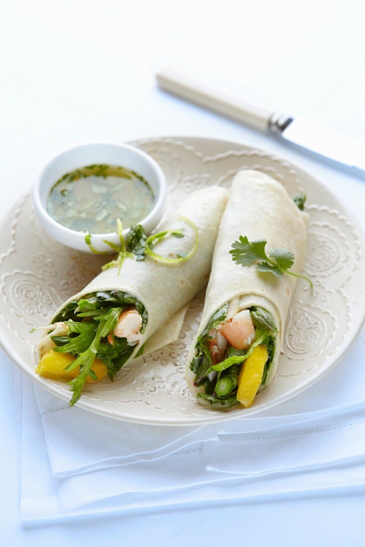 Prawn and mango filled wraps with a coriander and lime dip