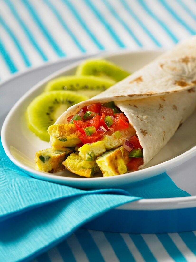 A fajita filled with vegetable omelette