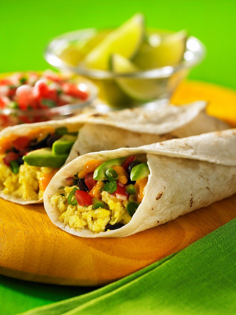 Breakfast wraps with scrambled eggs and avocado