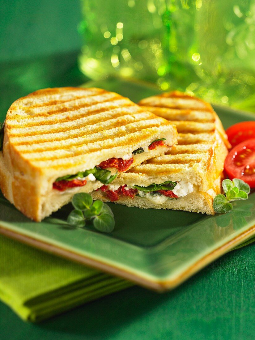 A spinach, goat's cheese and dried tomato panini