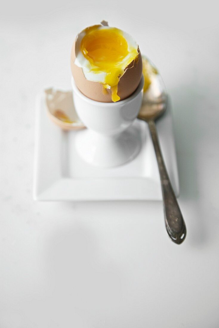 Soft Boiled Egg in Egg Cup with Top Broken Off