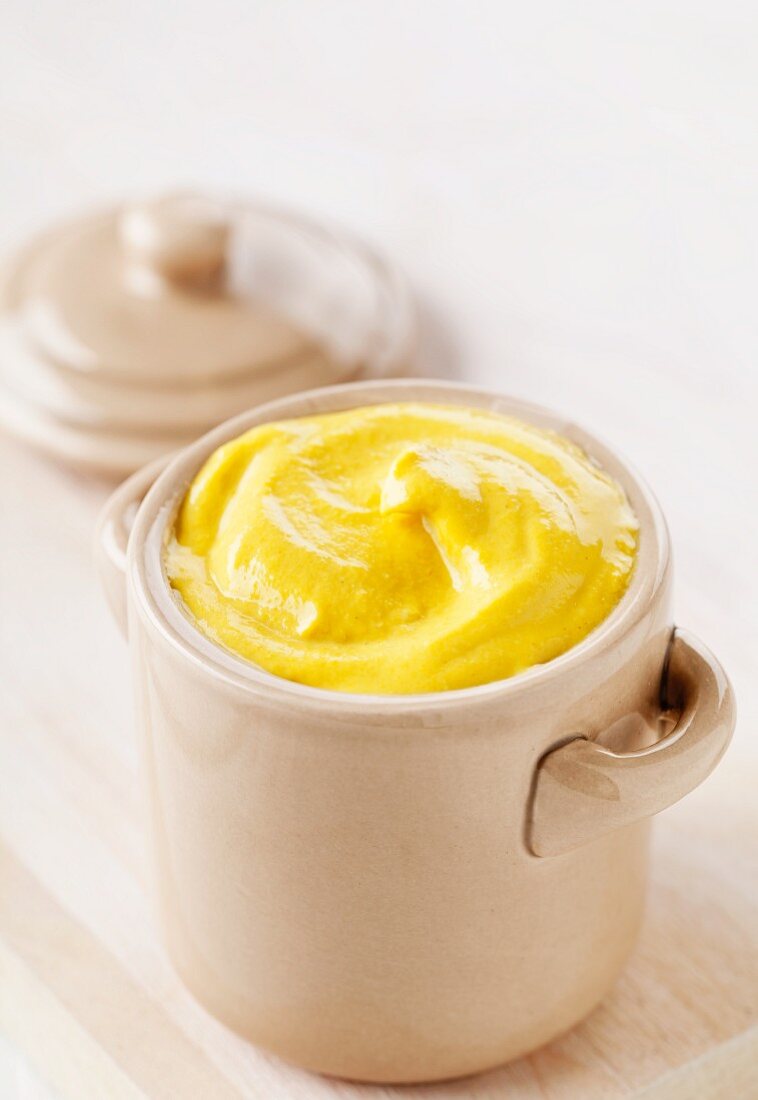 Medium hot mustard in a mustard pot