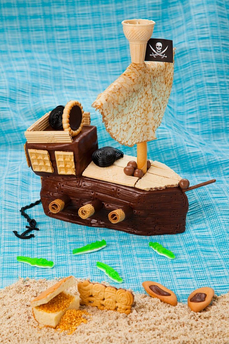 A pirate ship chocolate cake with a pancake sail