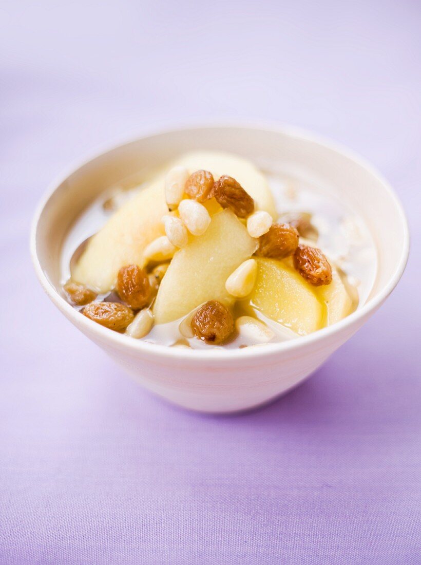 Apple compote with raisins and pine nuts