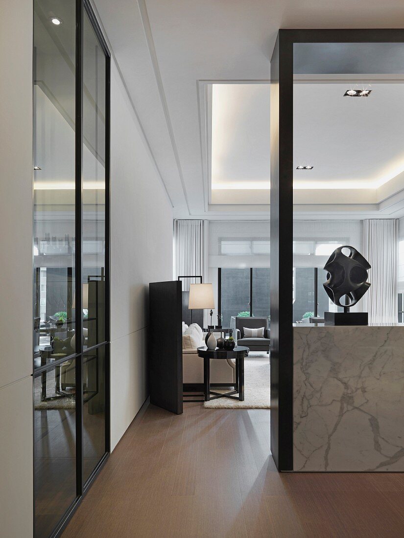 View through modern home with hardwood floor