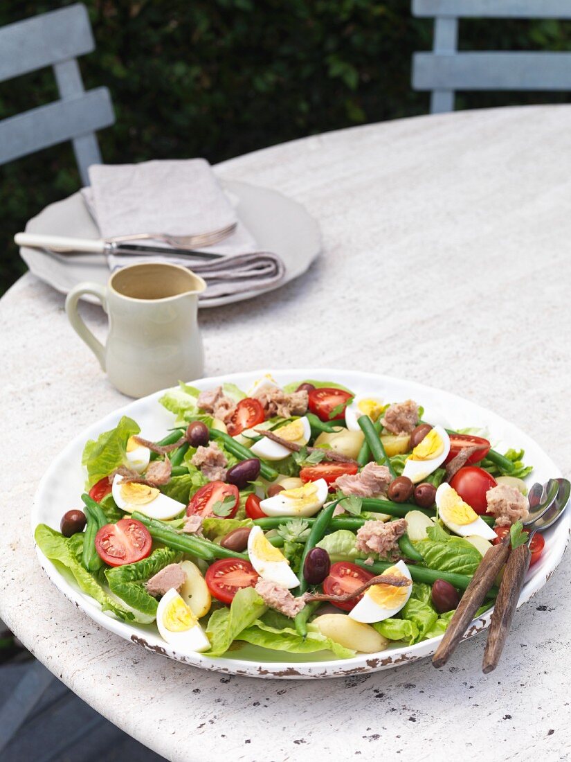 Nizza salad on a garden table