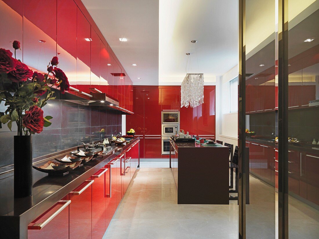 Kitchen with bright red cabinets