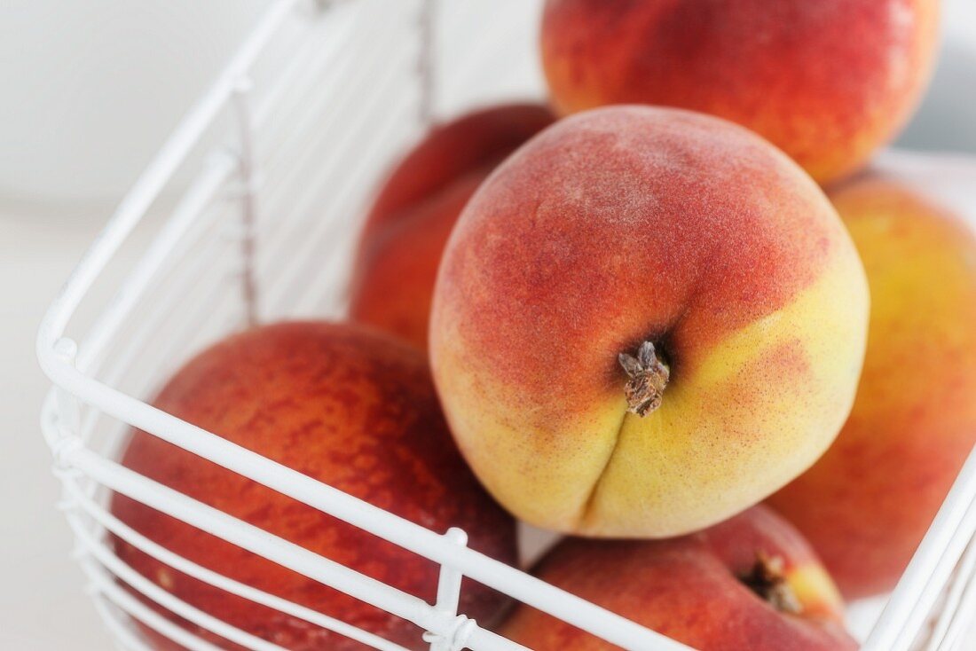 Fresh peaches in a basket
