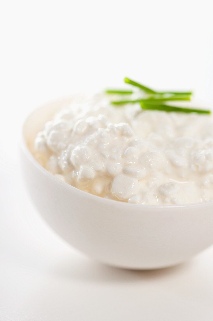 A bowl of cottage cheese with chives
