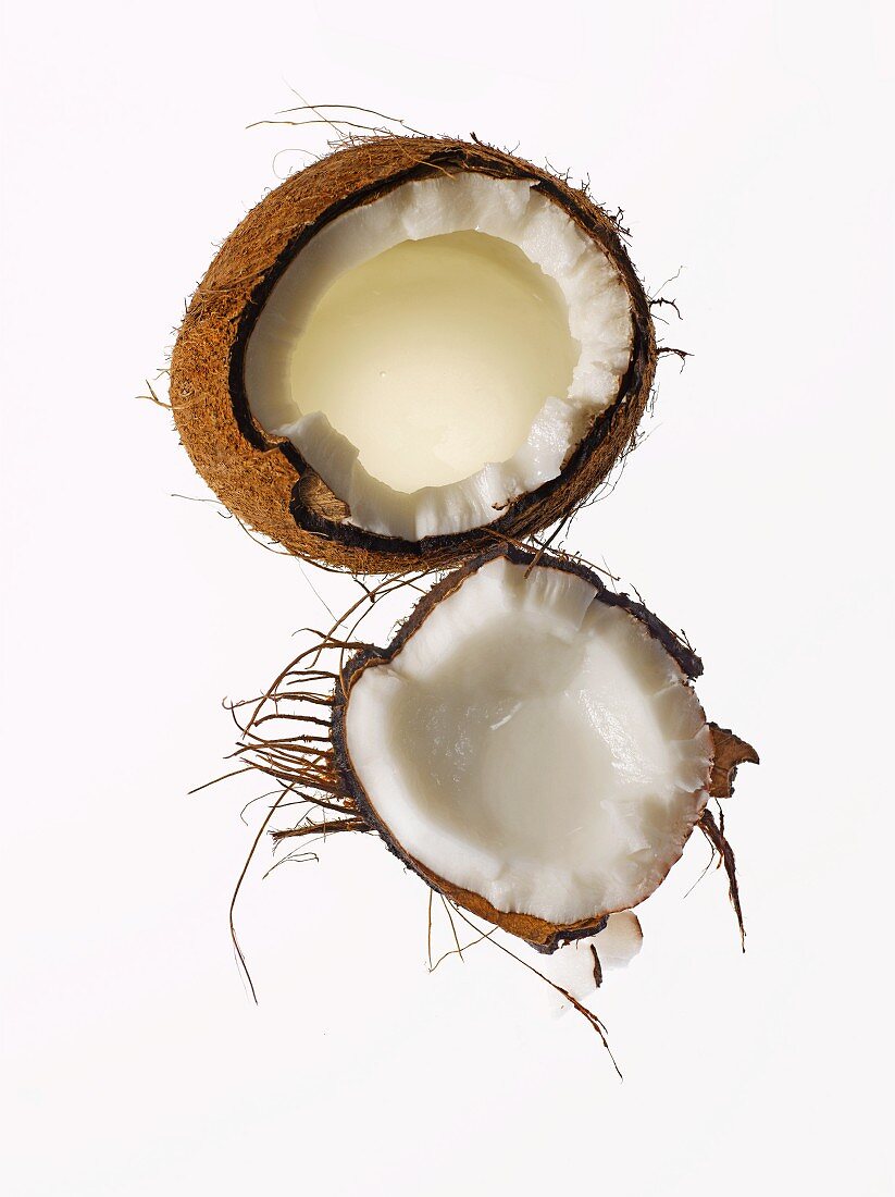 Coconut Broken Open on a White Background