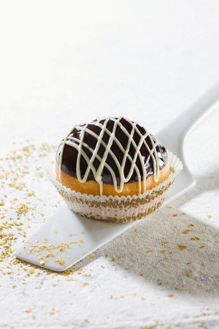 A Hanukkah doughnut topped with chocolate glaze