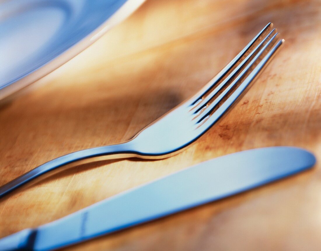Cutlery on a wooden surface