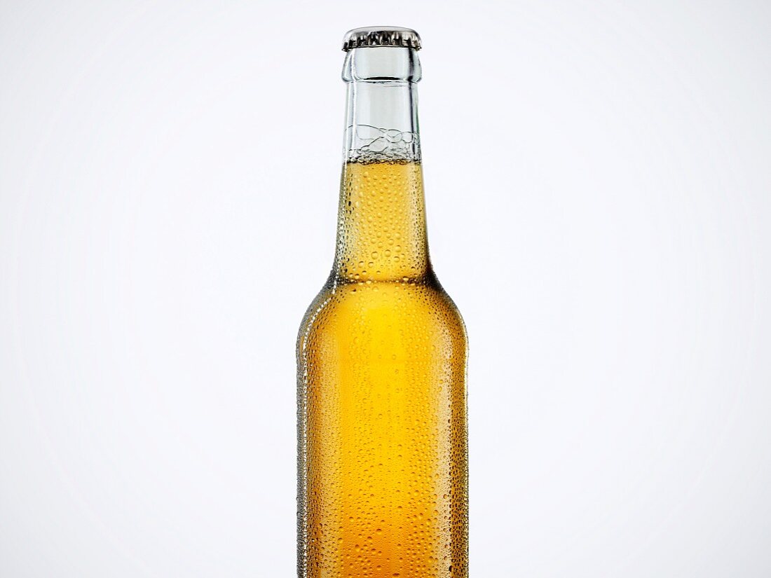 A bottle of beer with a bottle cap