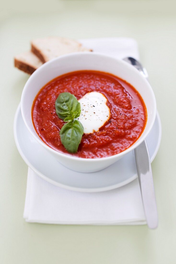 Tomato soup with crème fraîche and basil