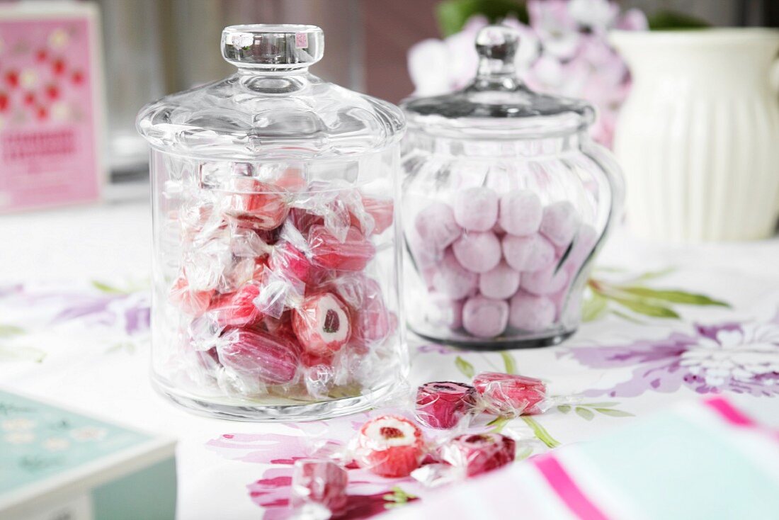 Jars of candies on table