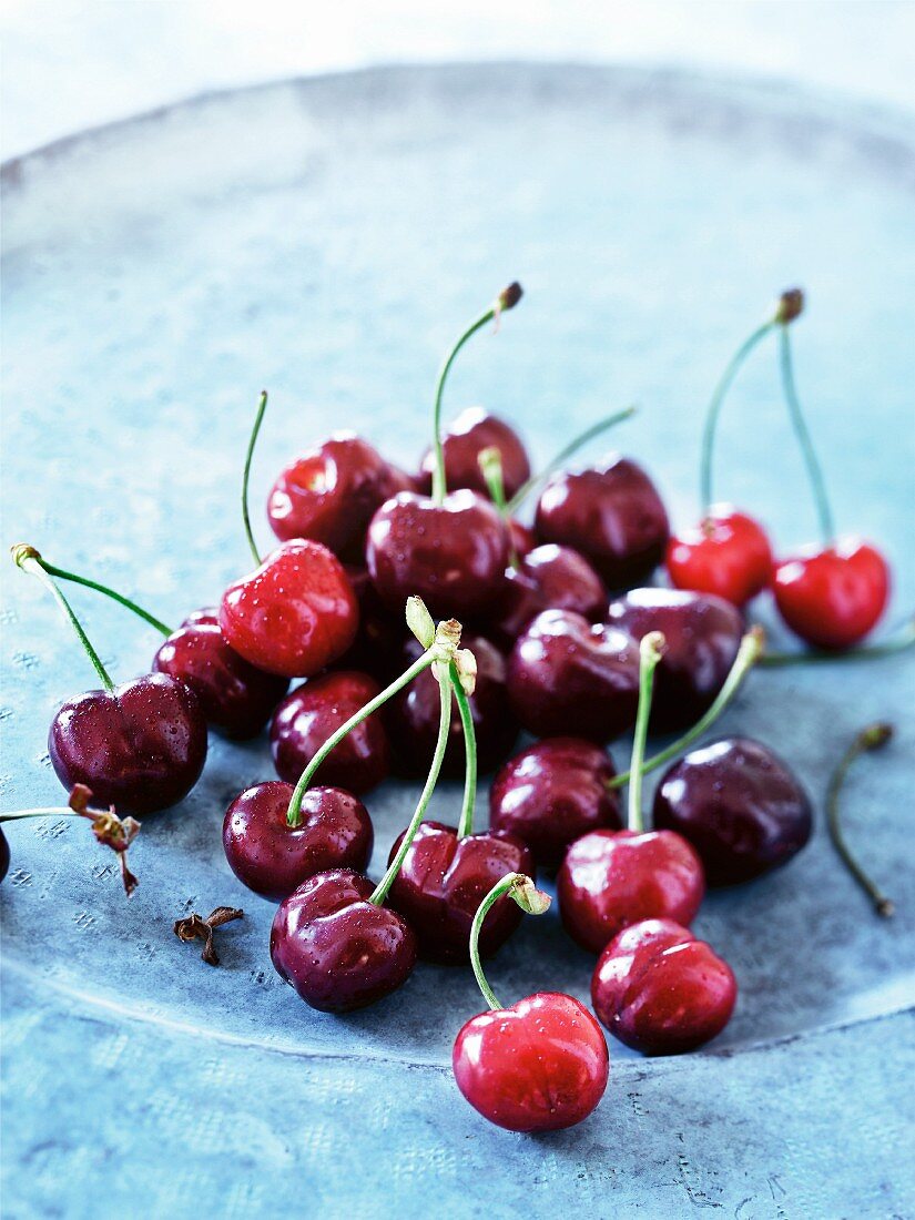 Close up of plate of cherries
