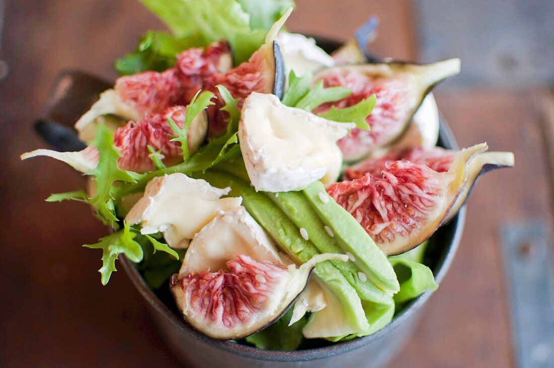 A salad with figs and soft cheese