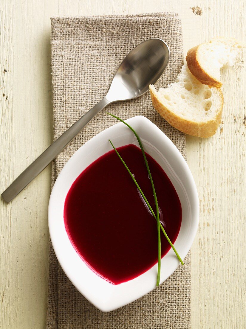 Cream of beetroot soup with bread