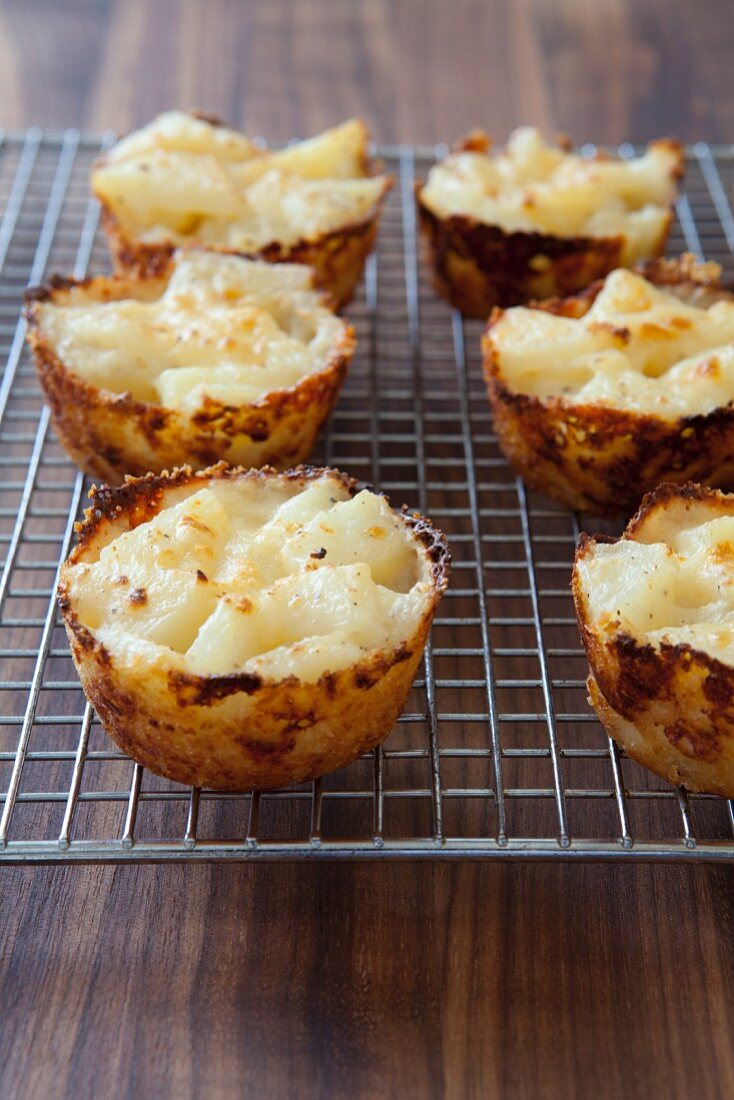 Individual Cheese and Potato Cakes on a Cooling Rack