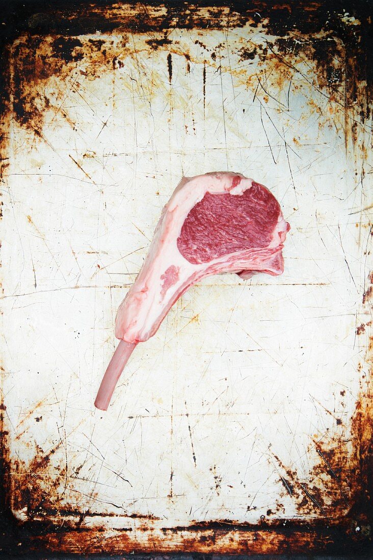 Raw Lamb Chop on a Sheet Pan