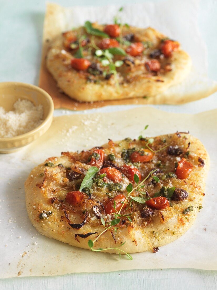 Pesto Pizzas with Tomatoes and Olives