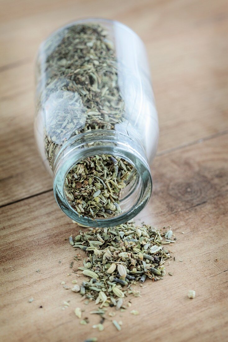 Herbs de Provence falling out of a jar