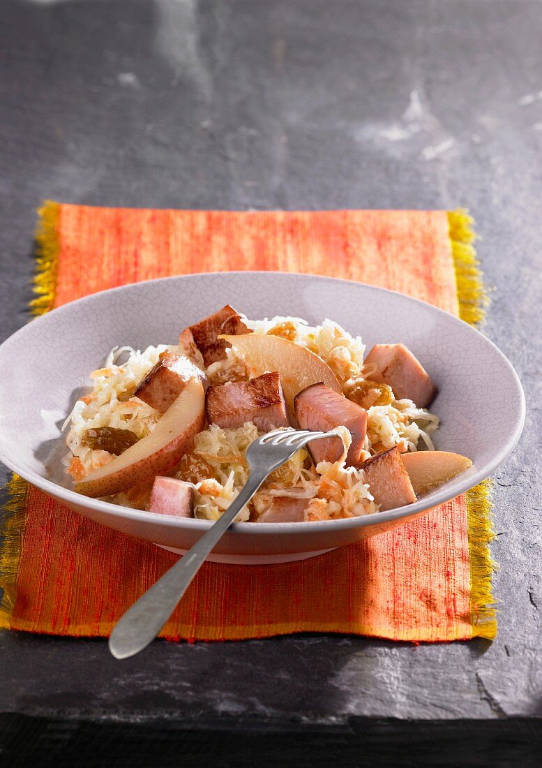 Sauerkraut salad with smoked pork and pears