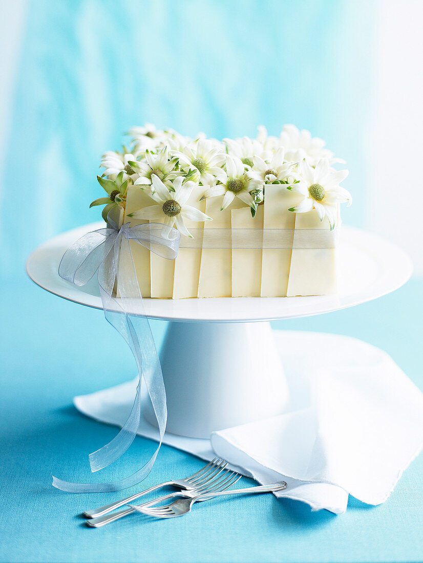 A sponge cake with passion fruit puree and white chocolate