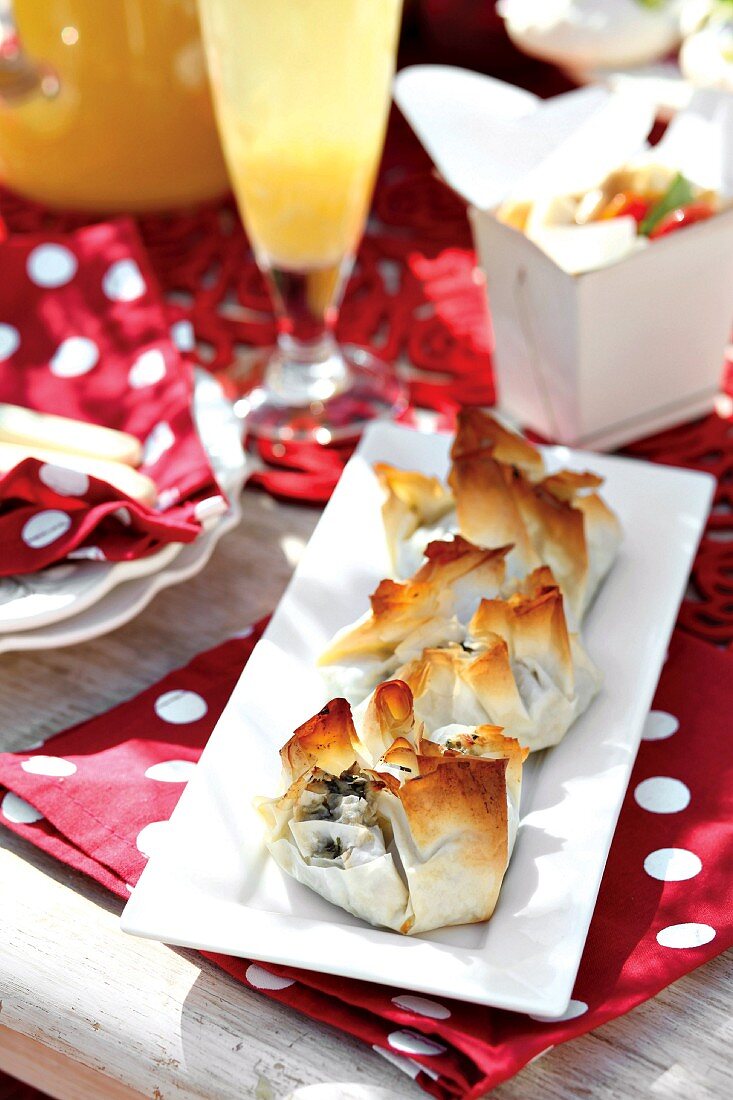 Filo pastry parcels filled with chicken and spinach