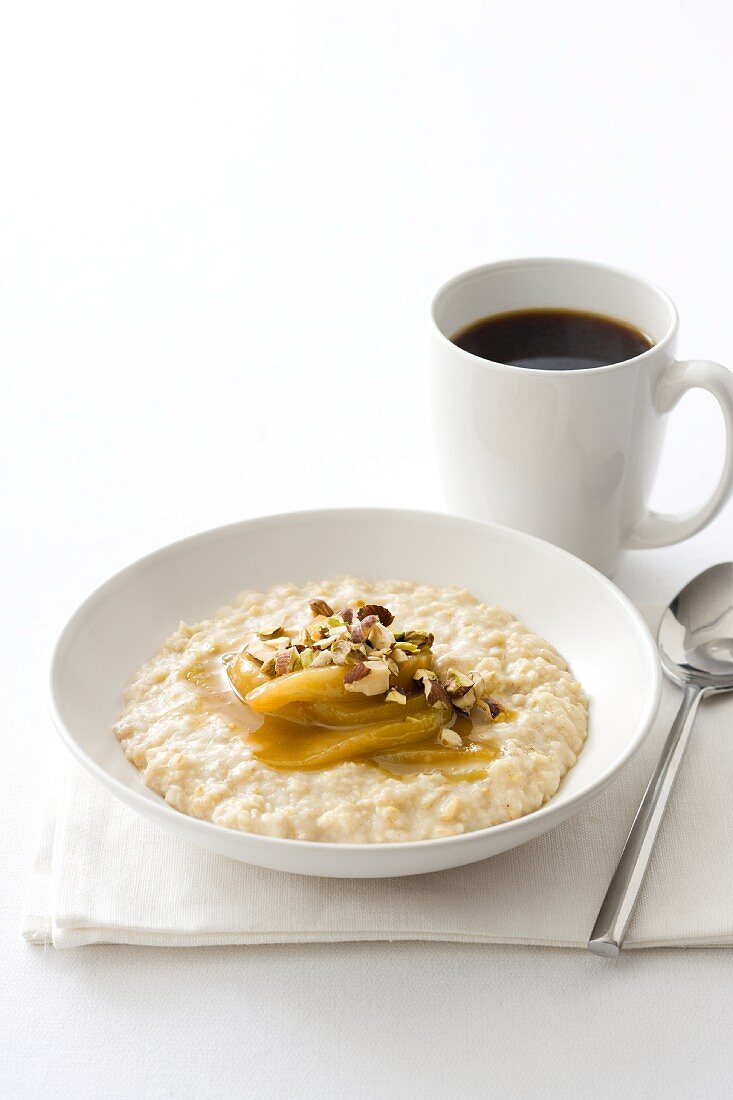 Porridge in a bowl with a cup of coffee