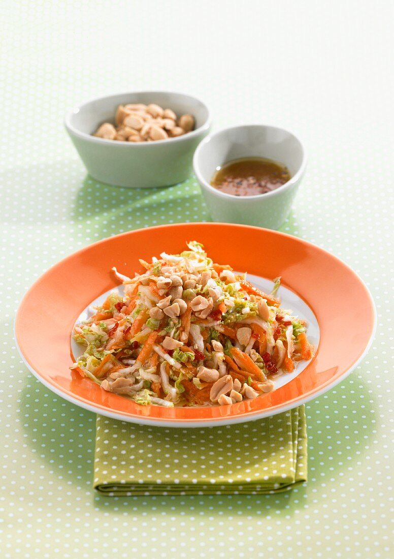 Sweet and spicy cabbage salad with peanuts and carrots