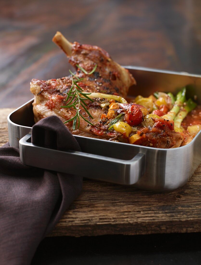 Braised lamb shoulder with rosemary and tomatoes