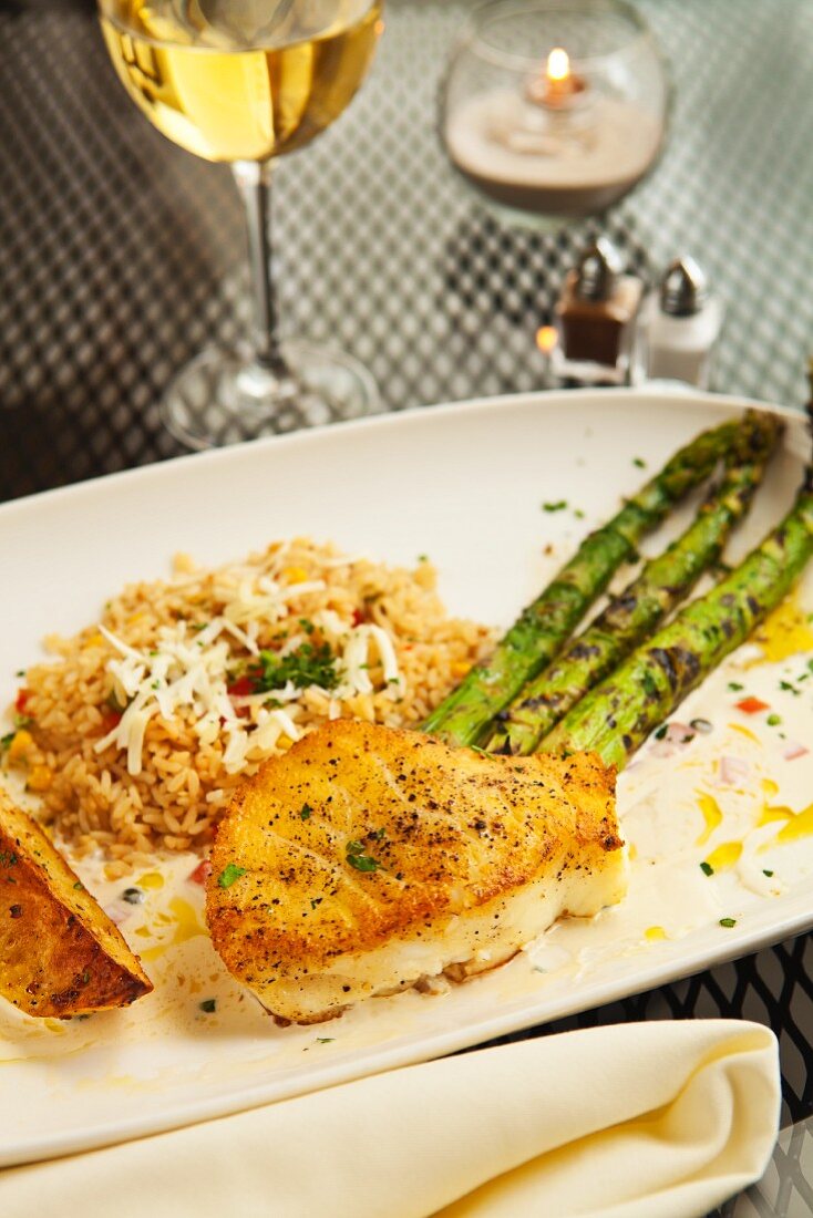 Sauteed Sea Bass with Asparagus, Rice and a Glass of Wine