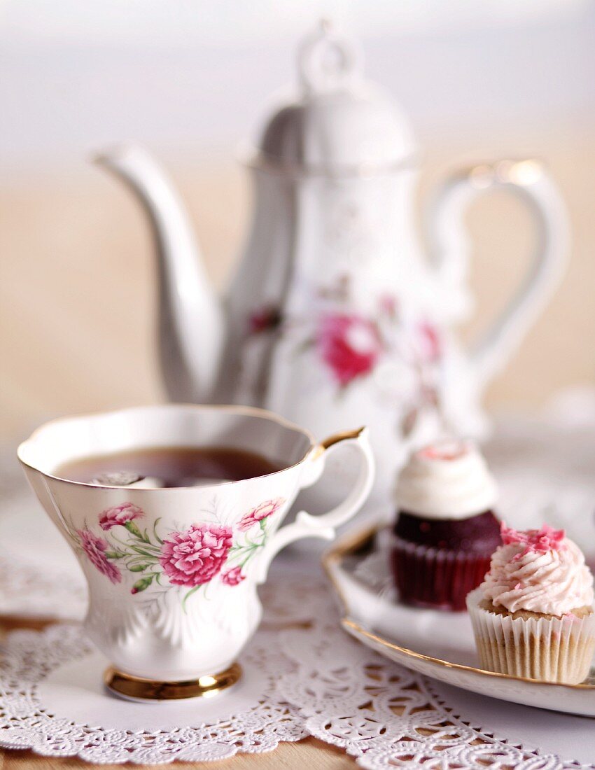 Pretty Antique Tea Cup with Mini Cupcakes and Tea Pot