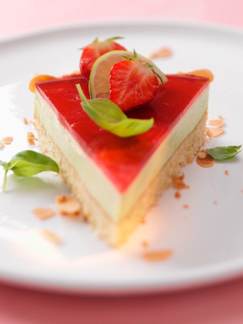 A slice lime and strawberry cake